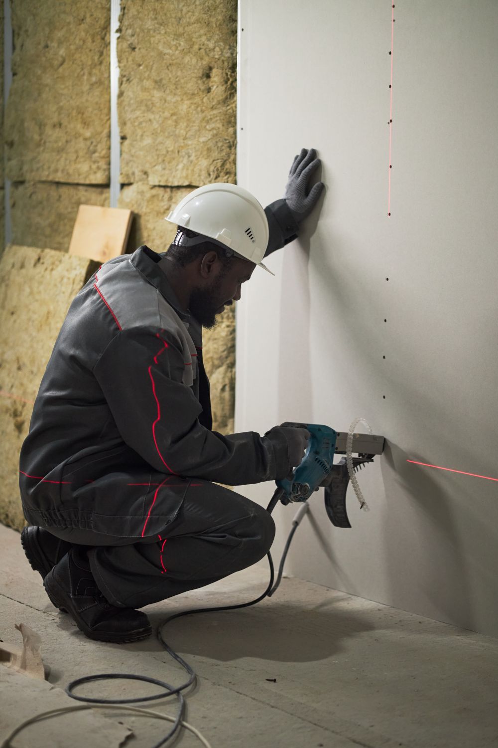 chantier de construction avec installation de gypse à Val d'Or